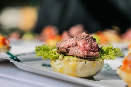 Sandwich hamburger with and mix of vegetables. Fast food. Delicious hamburgerの写真素材