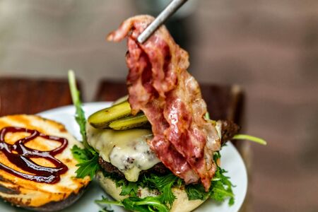 Sandwich hamburger with and mix of vegetables. Fast food. Delicious hamburger. Hamburger prepare to eatの写真素材