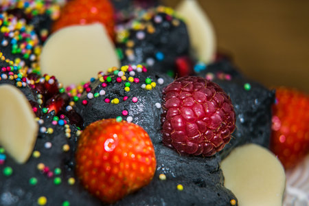 Pavlova dessert with fresh fruit and sweet cream.Closeupの写真素材