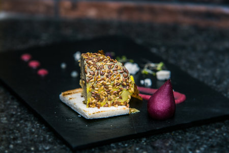 Liver pate wrapped in sesame on toast. Food styling and restaurant meal serving.の写真素材