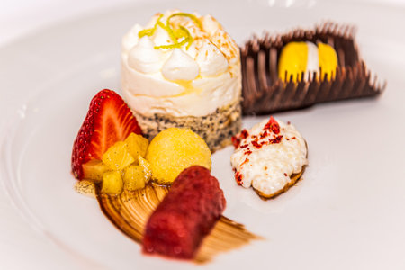 Sweet dessert with fresh fruits on plate. The food in the restaurant. Food styling and restaurant meal serving.の写真素材