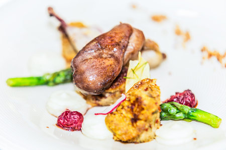 Duck breast with asparagus. The food in the restaurant. Food styling and restaurant meal serving.