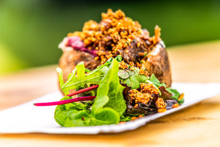Stuffed potato with vegetables. Food styling for street food. Closeup.