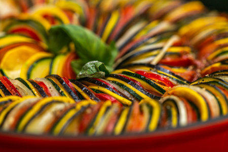 Chef preparing traditional Provençal vegetable dish Ratatouille. Healthy eating. Delicious vegetableの写真素材