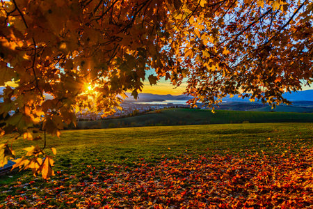Stunning autumn morning view of the Liptov basin and Liptovska Mara reservoir framed by vibrant...