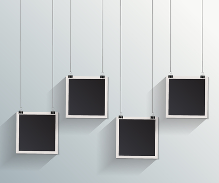 Blank retro vintage photo frame set hanging on a clip. Realistic detailed photo icon design template. Vector isolated on white wall background.のイラスト素材