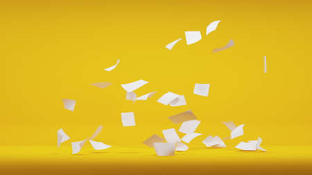 Flying sheets of white paper swirling in the air in a whirlwindの写真素材