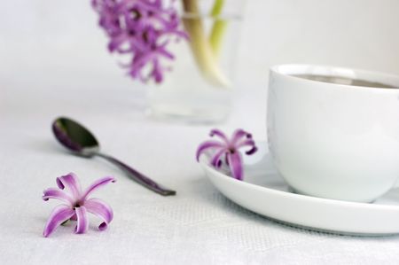 Cup of tea and pink flowerの写真素材