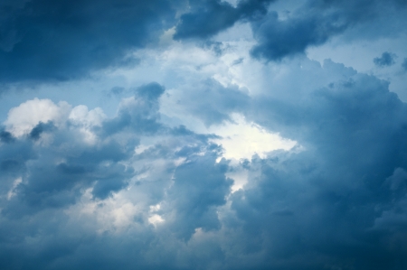 Dark, ominous stormy sky with clouds before the rainの写真素材