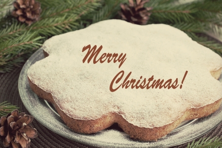 Christmas card with tasty cake and fir, top view, retro styleの写真素材