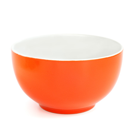 White and orange bowl isolated on white background の写真素材
