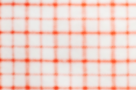 orange and white checkered style texture wallpaper, defocusedの写真素材