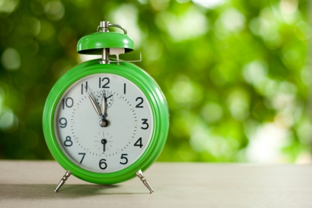Clock showing five to twelveの写真素材