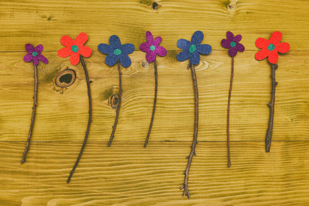 Image  of flowers wooden table.Toned photo.の写真素材