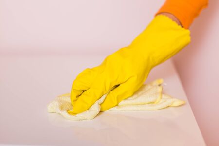Image of housewife cleaning table with mop.の写真素材