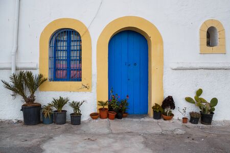 Old door and windows,part of the house in Morocco.の写真素材