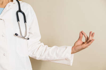 Image of female doctor meditating.の写真素材