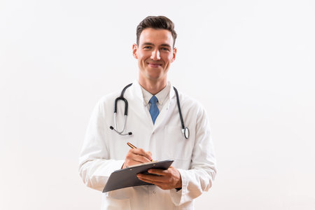 Image of doctor writing notes .