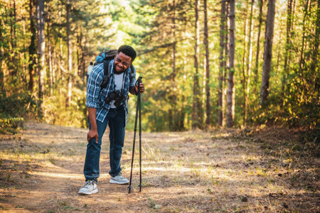 Hiker has got injury in leg while hiking in the nature.の写真素材