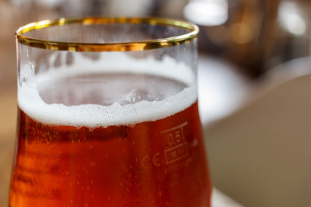 glass with beer on a table in the restaurant