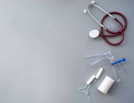 layout with medical instruments, tampons, on a gray background.の写真素材