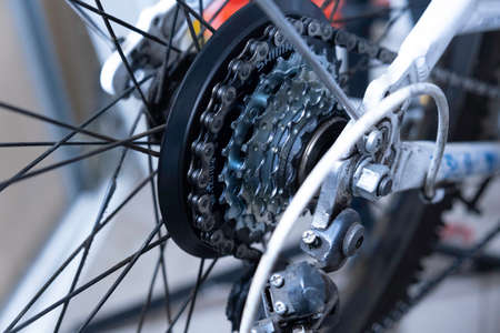 Closeup of a bicycle gears mechanism and chain on the rear wheel of mountain bike.の写真素材