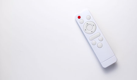 White remote control on a white background. Layout with copy space.の写真素材