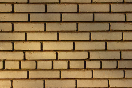 White wall of smooth rectangular silicate brick