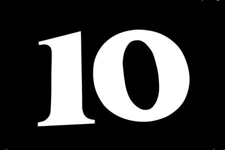 on a black background the numeral ten whiteの写真素材