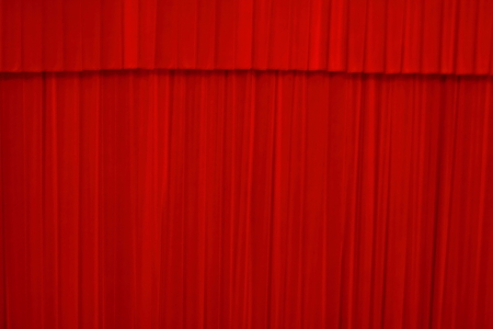 Theatrical curtain of red color is closedの写真素材