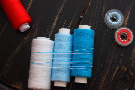 spools of thread and bobbin