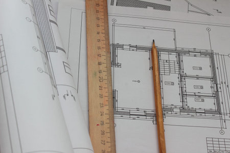 are a lot of drawings, ruler, a pencil