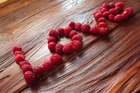 word love laid out from raspberriesの写真素材