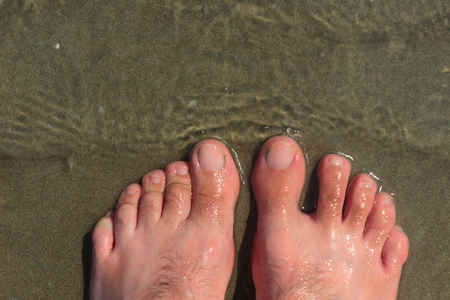 top view of a foot in the seaの写真素材