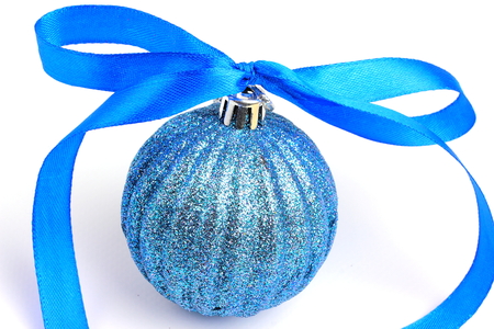 Christmas ball decorated with festive ribbonの写真素材