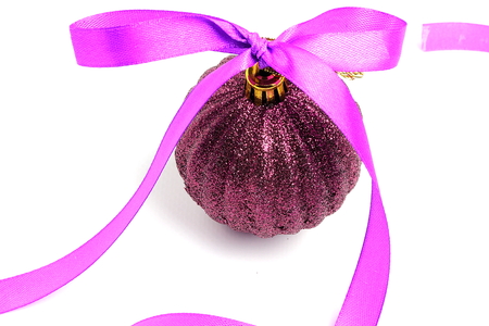 Christmas ball decorated with festive ribbonの写真素材