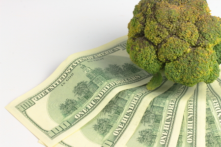 close-up cauliflower and dollarsの写真素材