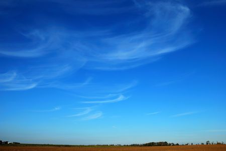 clouds against the blue sky before sunsetの写真素材
