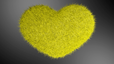 Yellow heart with black background.の写真素材