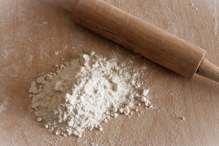 Italian cuisine, rolling pin and flour.の写真素材