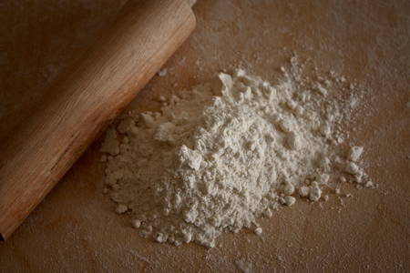 Italian cuisine, rolling pin and flour.の写真素材