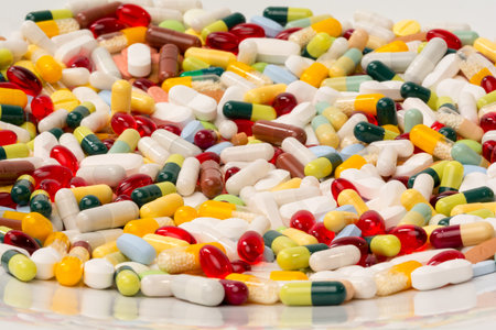 various pills and capsules as background の写真素材