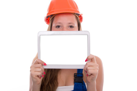 Young Craftswoman with toolbelt in education isolated の写真素材