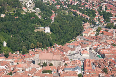 Overview of an old beautiful city in Romania. Aerial panorama of Brasov