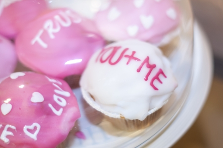 Tasty looking muffins in warm and vibrant colors made for wedding receptionの写真素材