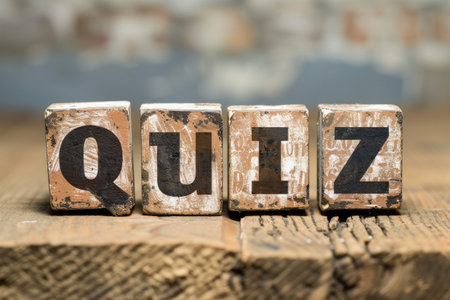 \The word \"\"Quiz\"\" written in vintage letterpress type on a grunge wooden background.\""の素材