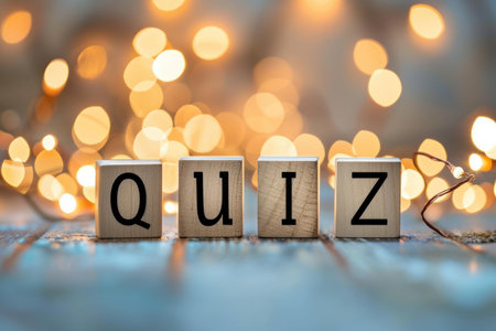 Quiz word on wooden cubes with bokeh lights background.の素材