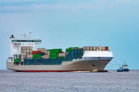 Grey container ship. Logistics and production importの写真素材