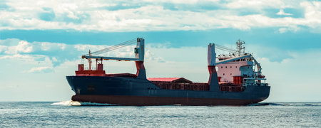 Merchandise import. Large blue cargo ship moving to Riga portの写真素材