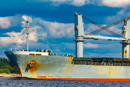 Grey cargo ship. Logistics and merchandise transportationsの写真素材